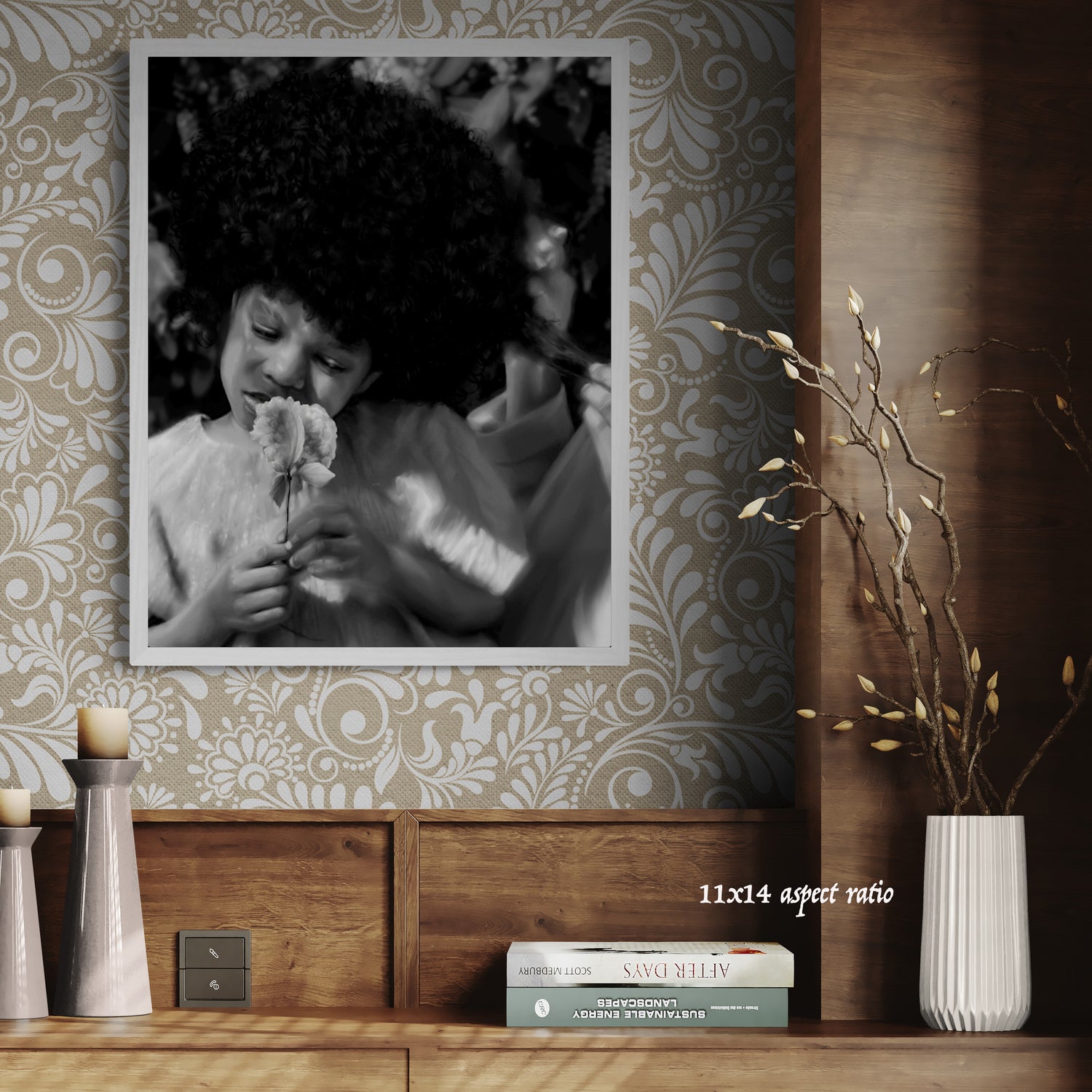 Framed black and white photo of a child holding a flower on a decorative wall with books and candles below.