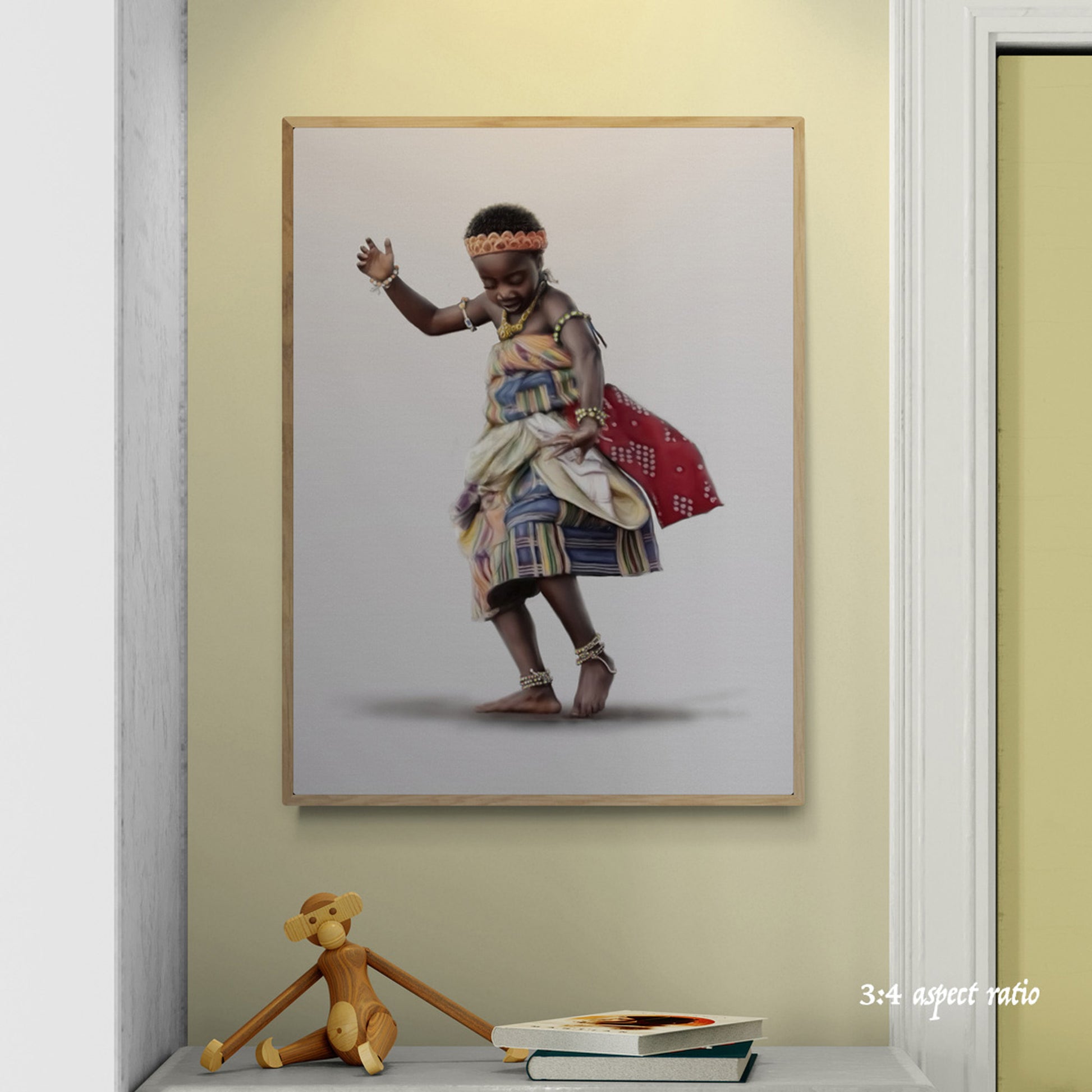 Framed artwork of a child in traditional attire on a wall with a monkey figurine and books below.